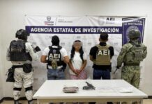 Detiene COE a mujer durante cateo, se le aseguraron 207 dosis de cocaína y un arma de fuego
