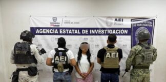 Detiene COE a mujer durante cateo, se le aseguraron 207 dosis de cocaína y un arma de fuego